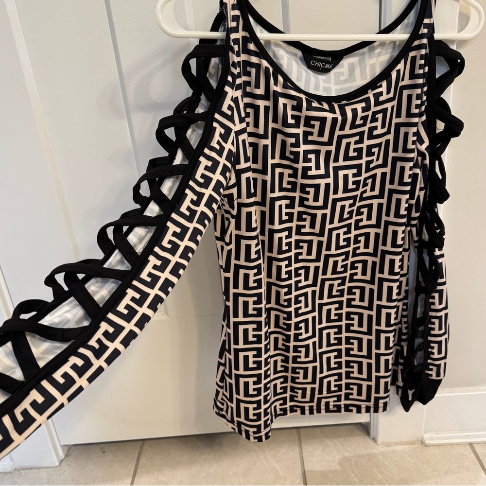 Chic Black and Cream Geometric Cutout Top